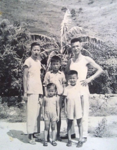 My dad in the middle, with his family in Hong Kong circa 1951.