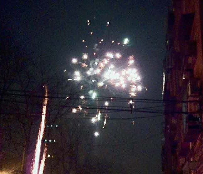 New Year's fireworks fired off the streets of Beijing. 