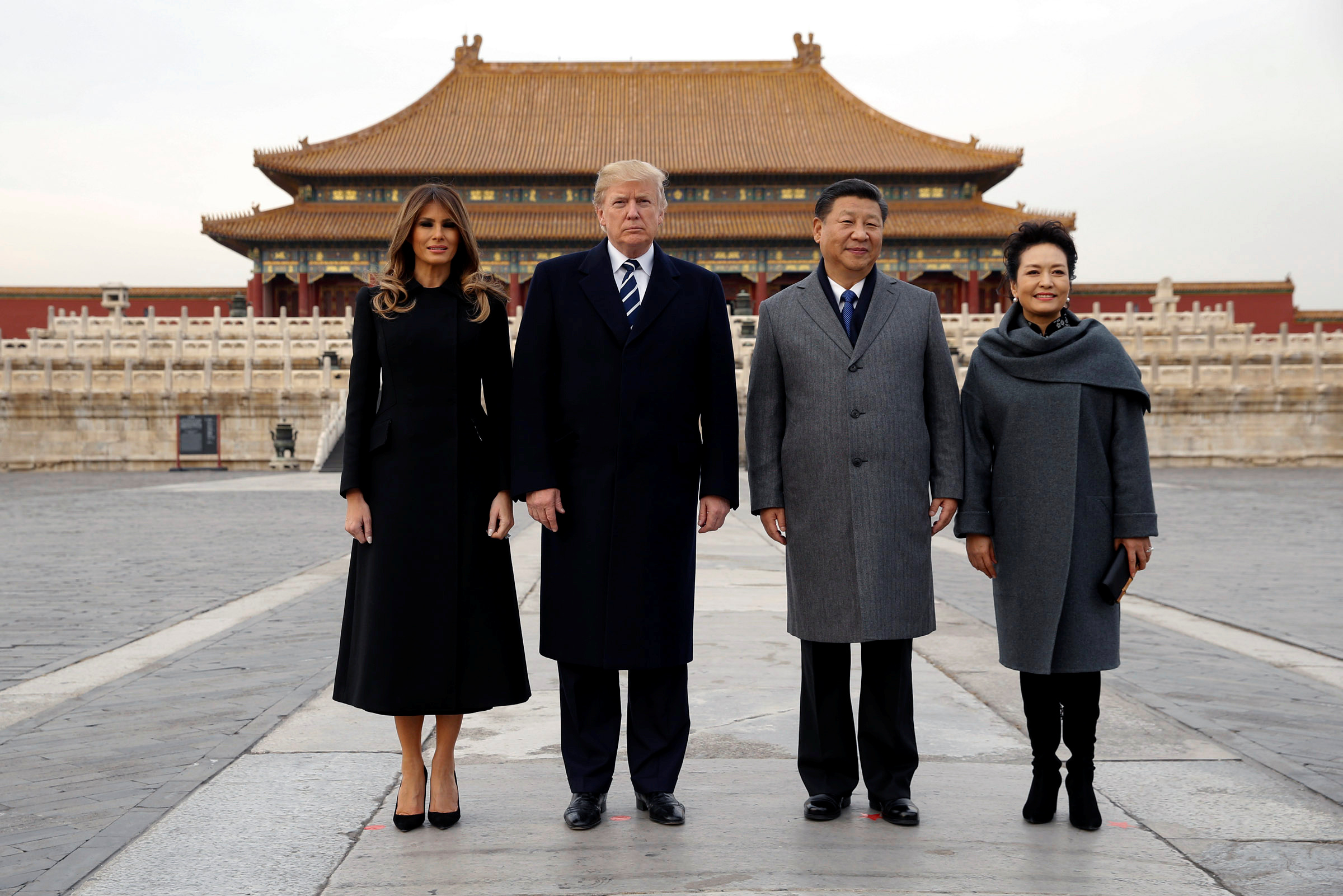 U.S. President Donald Trump and U.S. first lady Melania visit the Forbidden City with China's President Xi Jinping and China's First Lady Peng Liyuan in Beijing, China, November 8, 2017. REUTERS/Jonathan Ernst - RC13C8D168D0